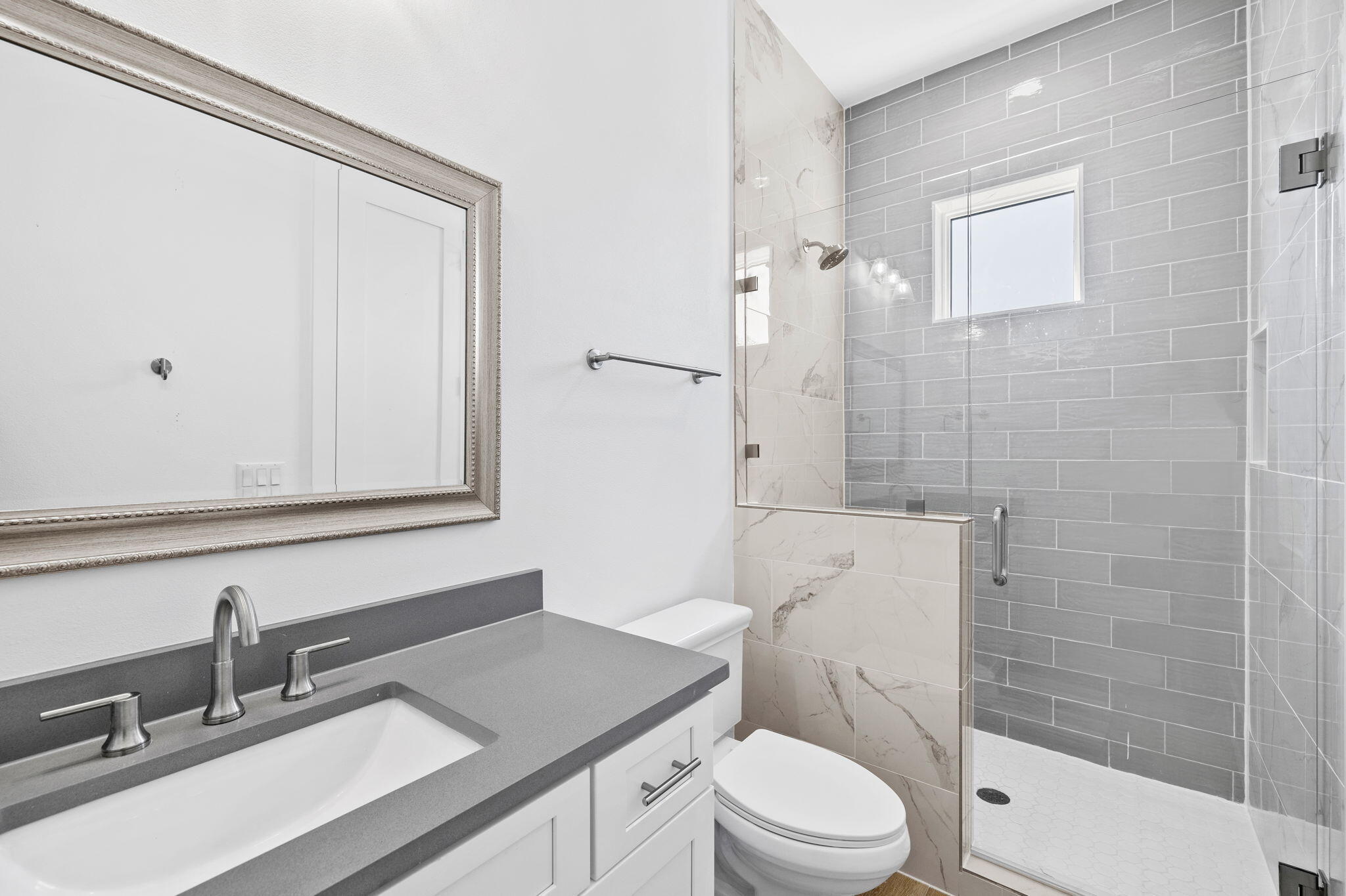 58 Carefree Lane Santa Rosa Beach, FL 32459 - Photo 35 of 44 a bathroom with a sink a toilet and shower