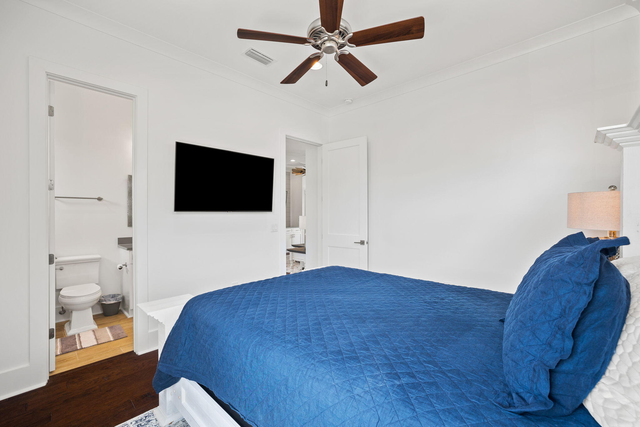 58 Carefree Lane Santa Rosa Beach, FL 32459 - Photo 37 of 44 a bedroom with a bed and a flat screen tv