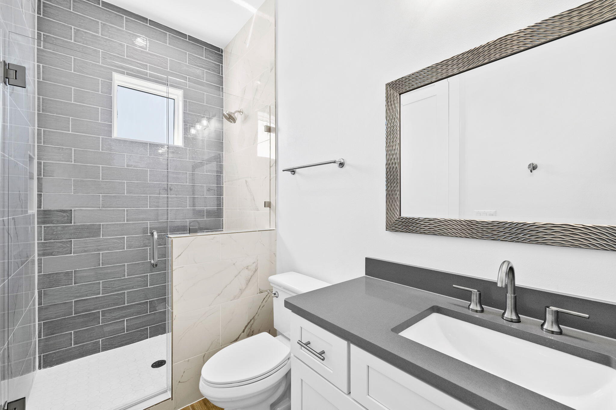 58 Carefree Lane Santa Rosa Beach, FL 32459 - Photo 38 of 44 a bathroom with a sink a toilet and shower