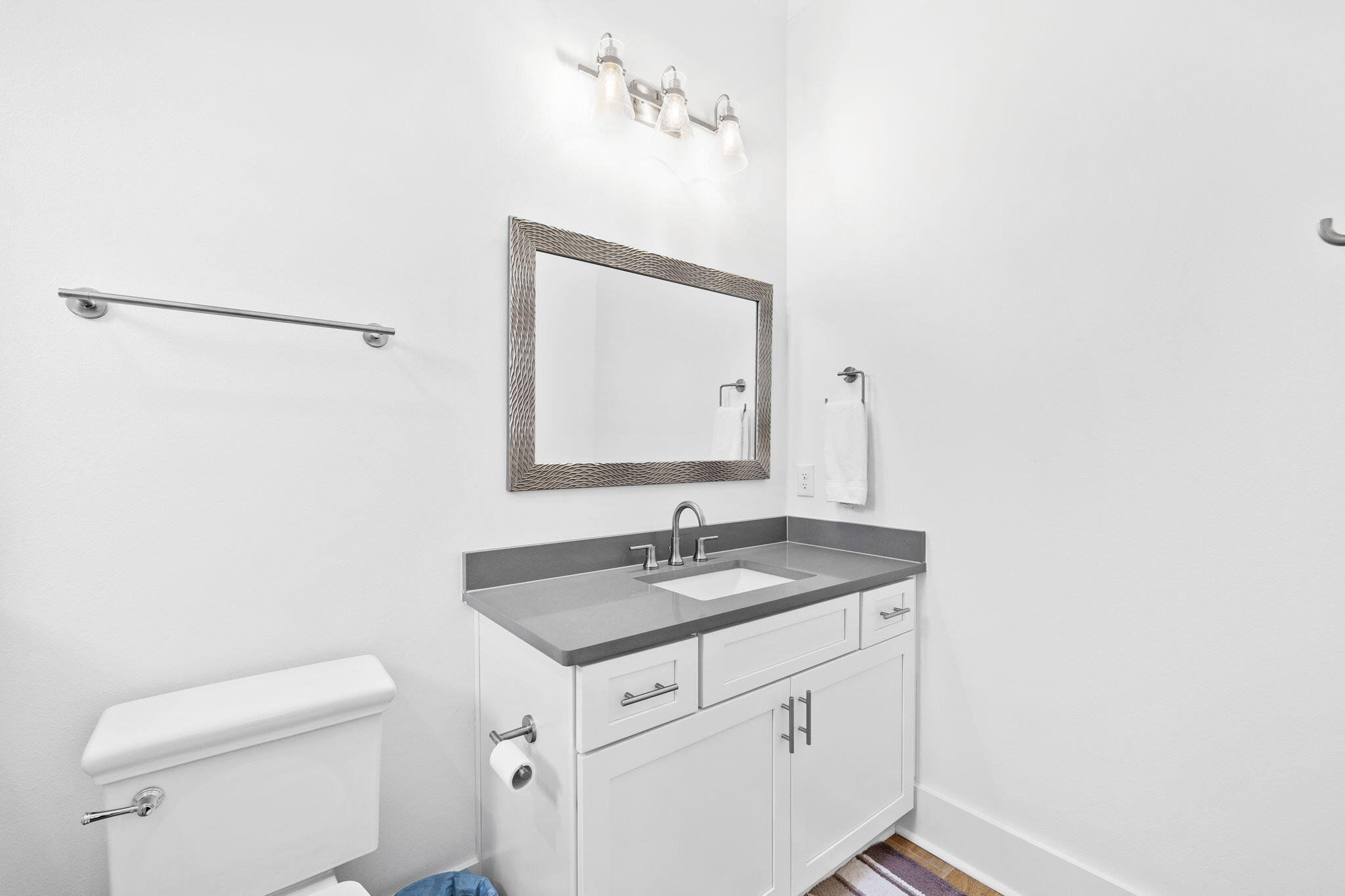 58 Carefree Lane Santa Rosa Beach, FL 32459 - Photo 39 of 44 a bathroom with a granite countertop sink and a mirror