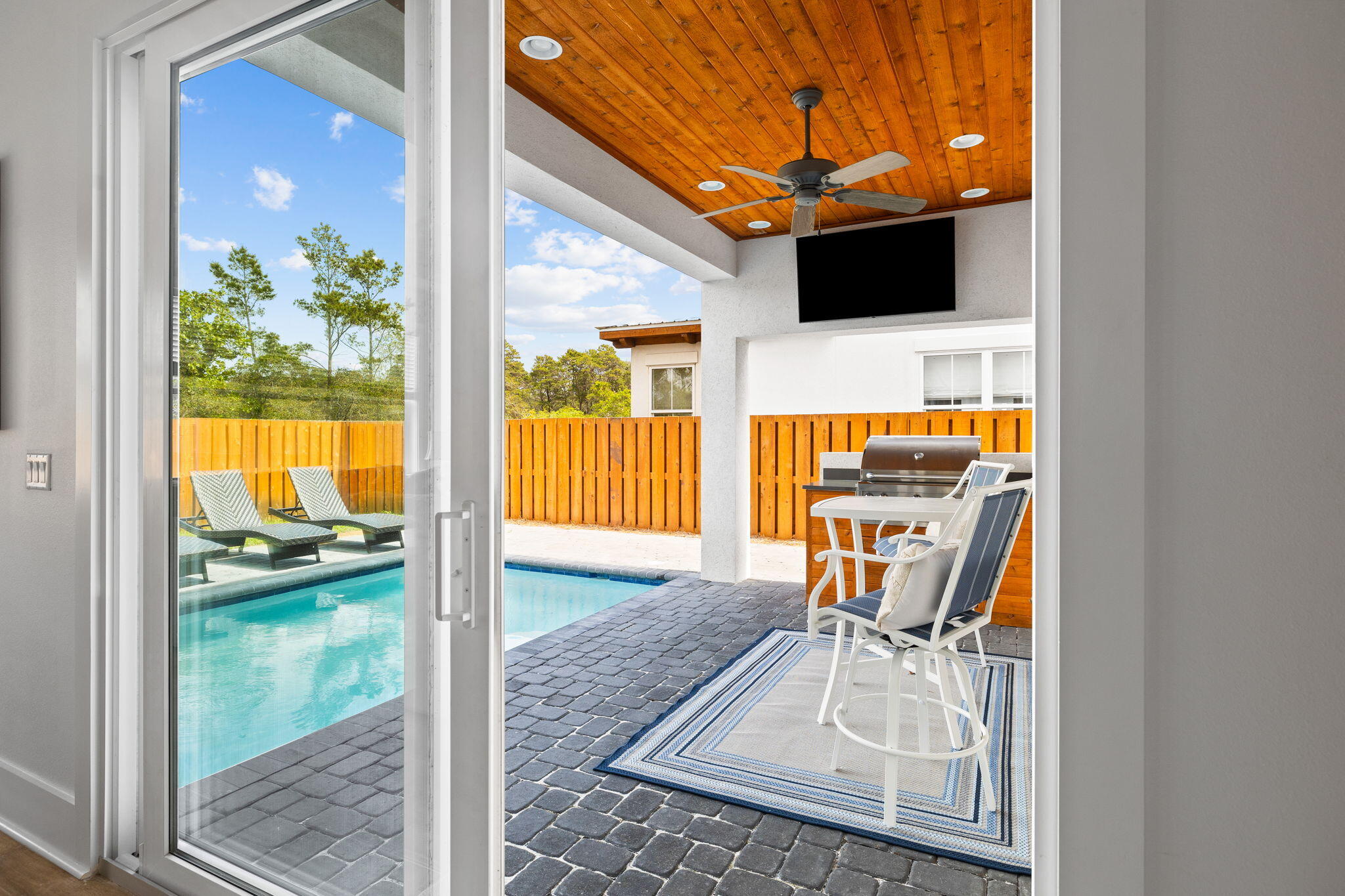 58 Carefree Lane Santa Rosa Beach, FL 32459 - Photo 40 of 44 a view of living room with furniture and floor to ceiling window