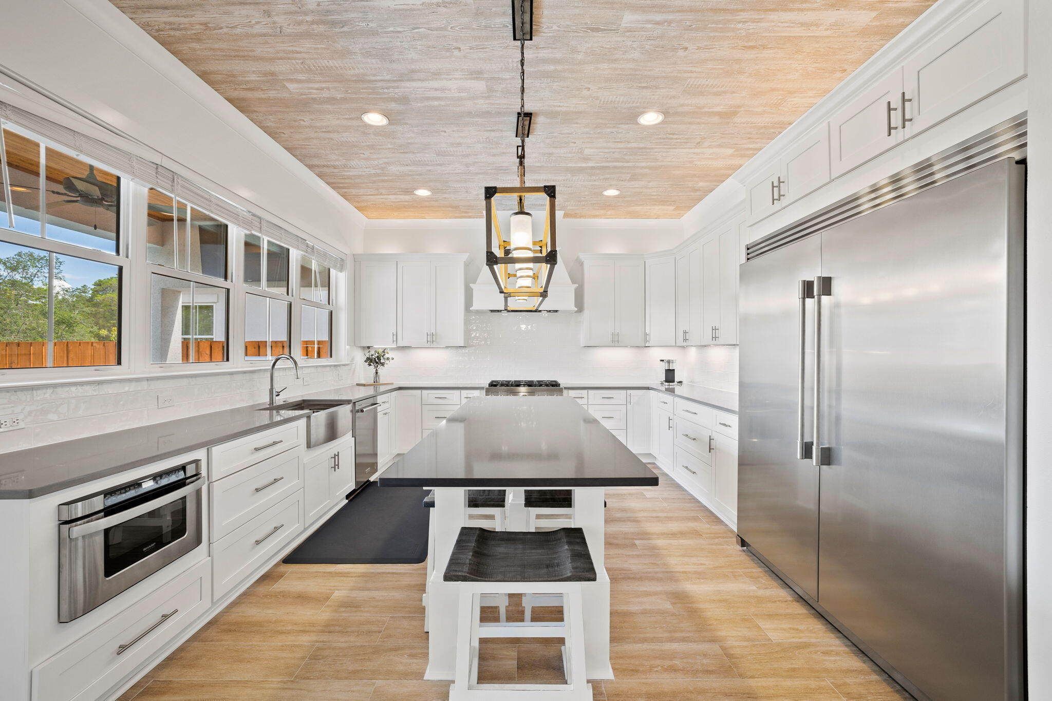 58 Carefree Lane Santa Rosa Beach, FL 32459 - Photo 4 of 44 a kitchen with granite countertop stainless steel appliances a stove and cabinets