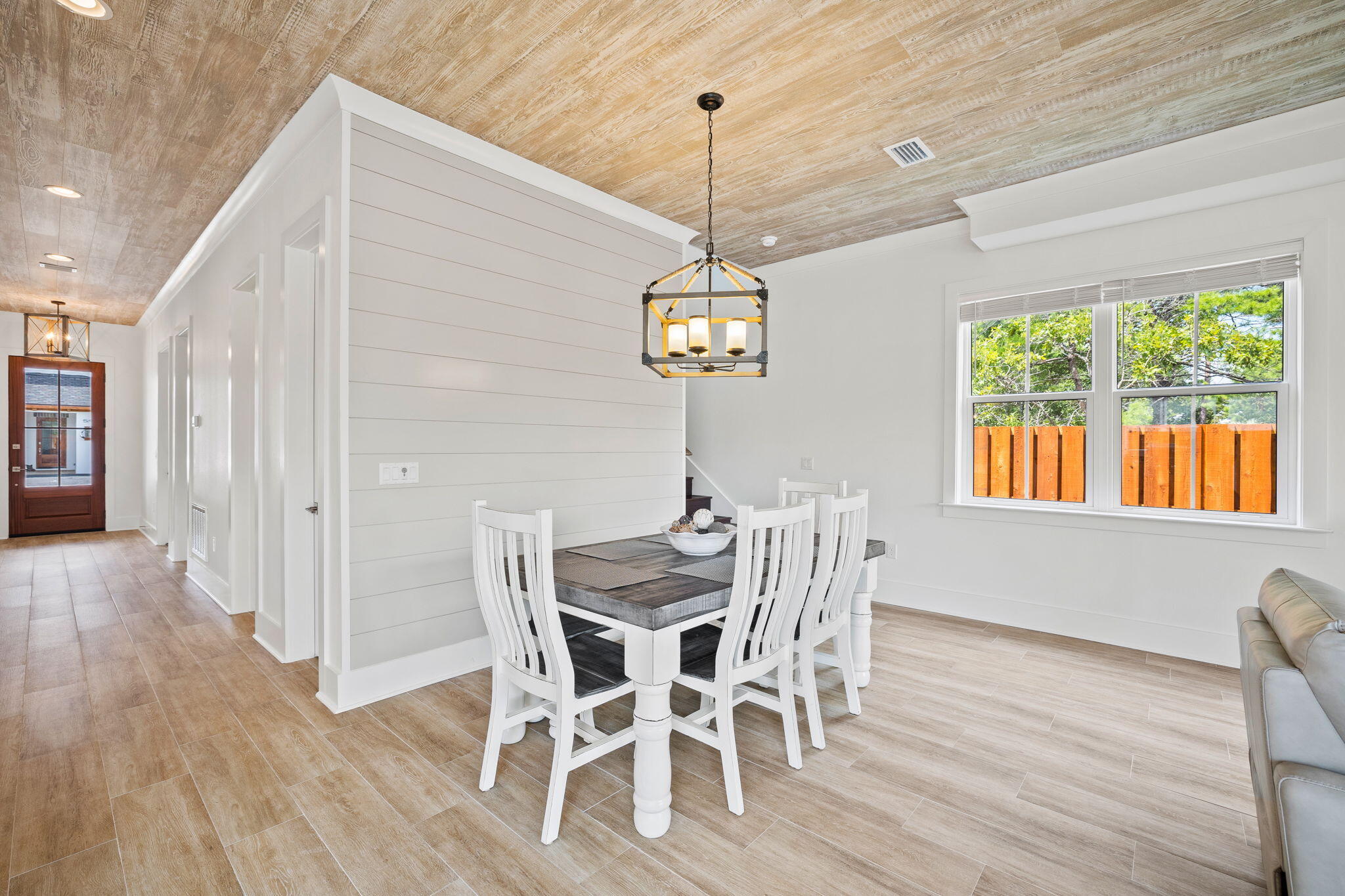 58 Carefree Lane Santa Rosa Beach, FL 32459 - Photo 9 of 44 a view of a dining room with furniture window and wooden floor