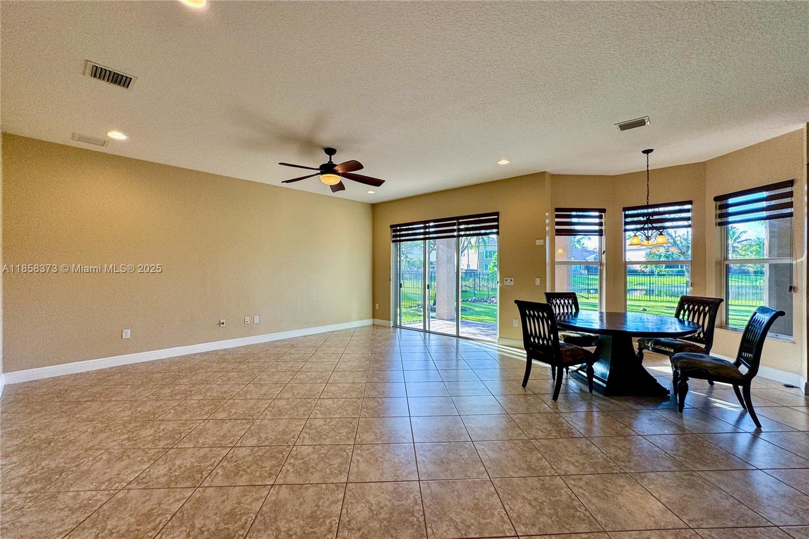 11894 Fox Hill Circle Boynton Beach, FL 33473 - Photo 10 of 35 a view of a livingroom with furniture and window