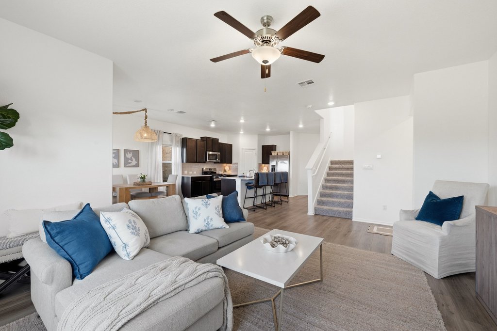 1233 Sweetspire Street Leander, TX 78641 - Photo 39 of 40 The open floor plan seamlessly connects the living room, dining area and kitchen, making gathering effortless.