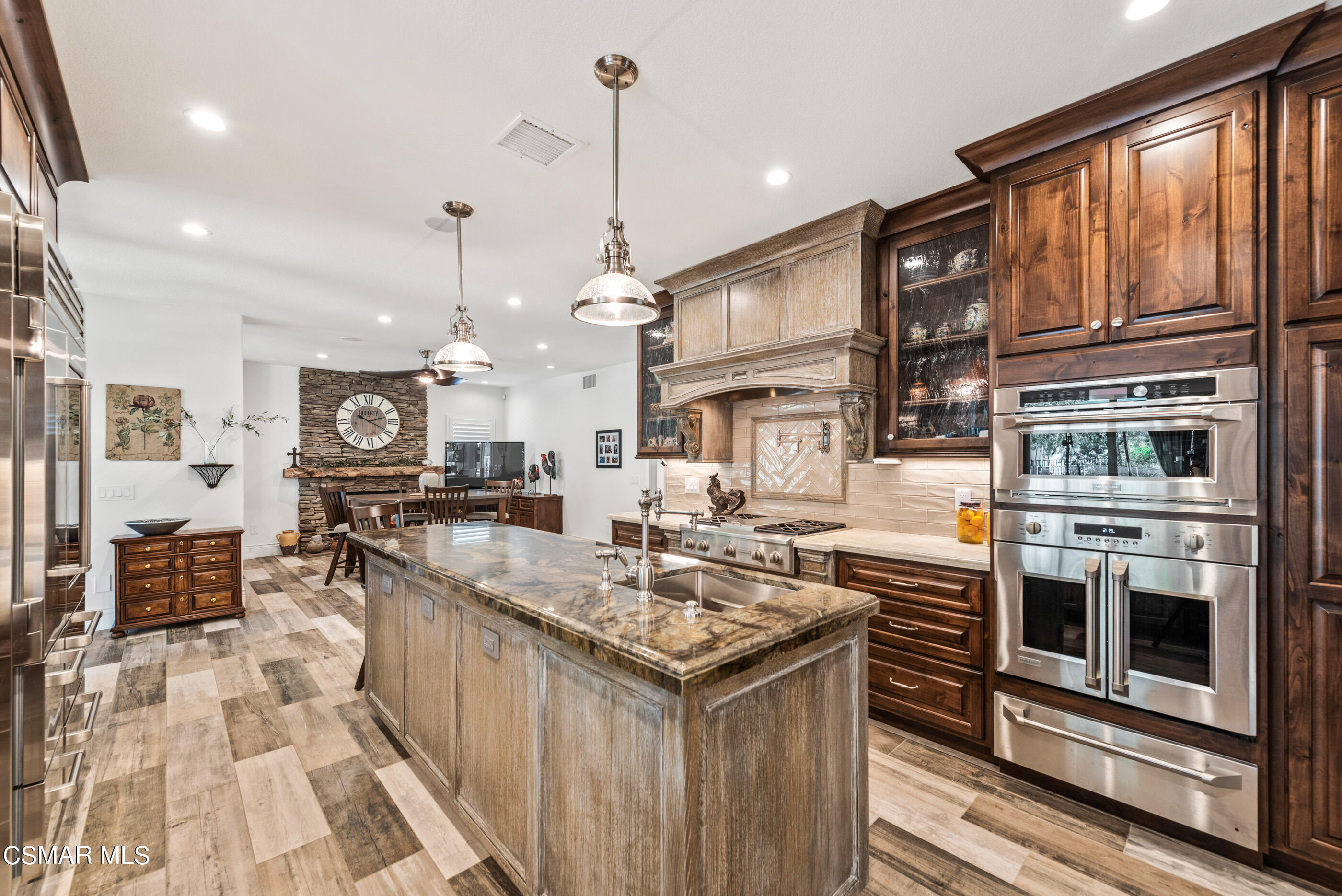 525 Aqueduct Court Simi Valley, CA 93065 - Photo 28 of 98 a kitchen with stainless steel appliances granite countertop a stove a sink and a refrigerator