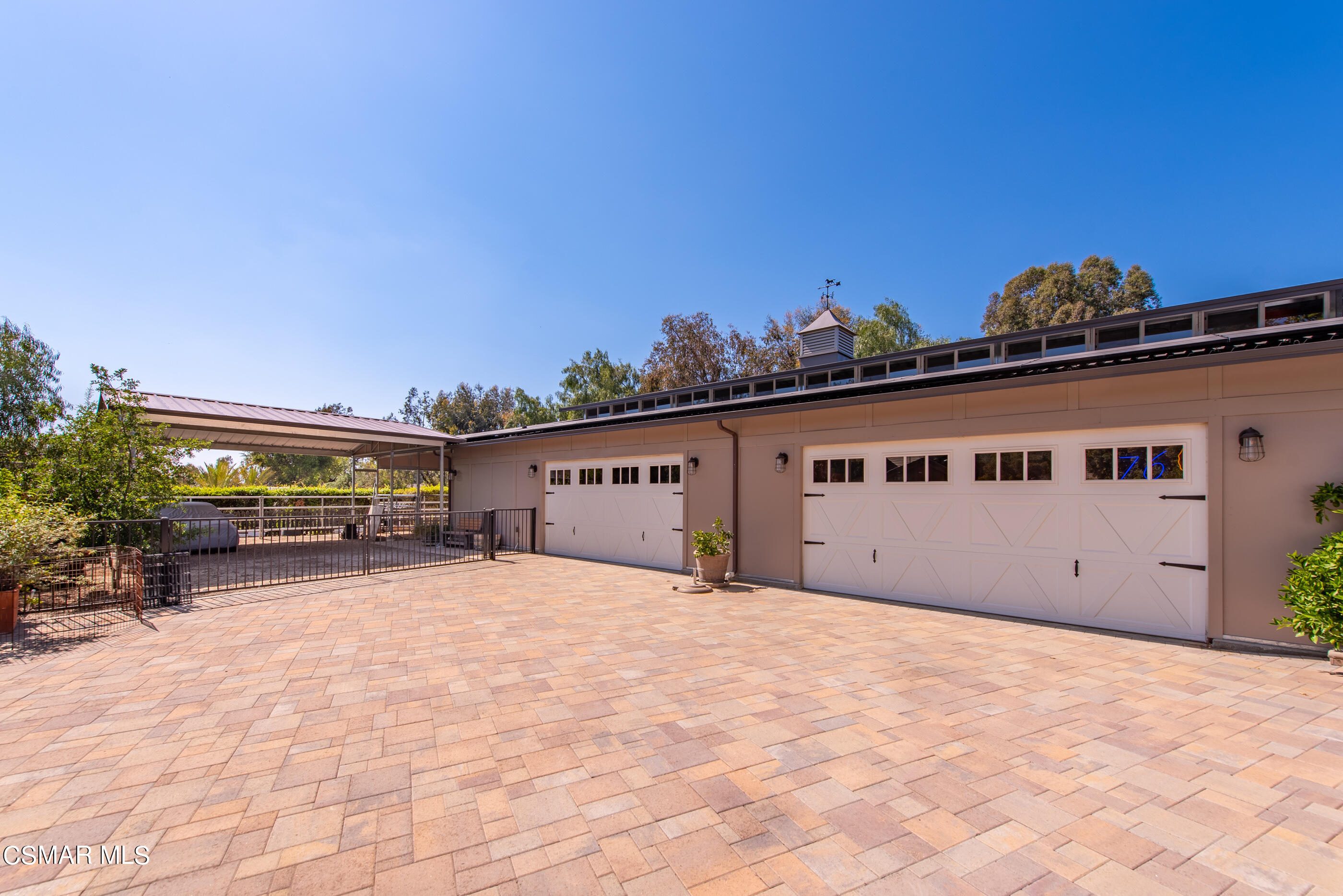 525 Aqueduct Court Simi Valley, CA 93065 - Photo 4 of 98 a view of a house with a big yard and large trees
