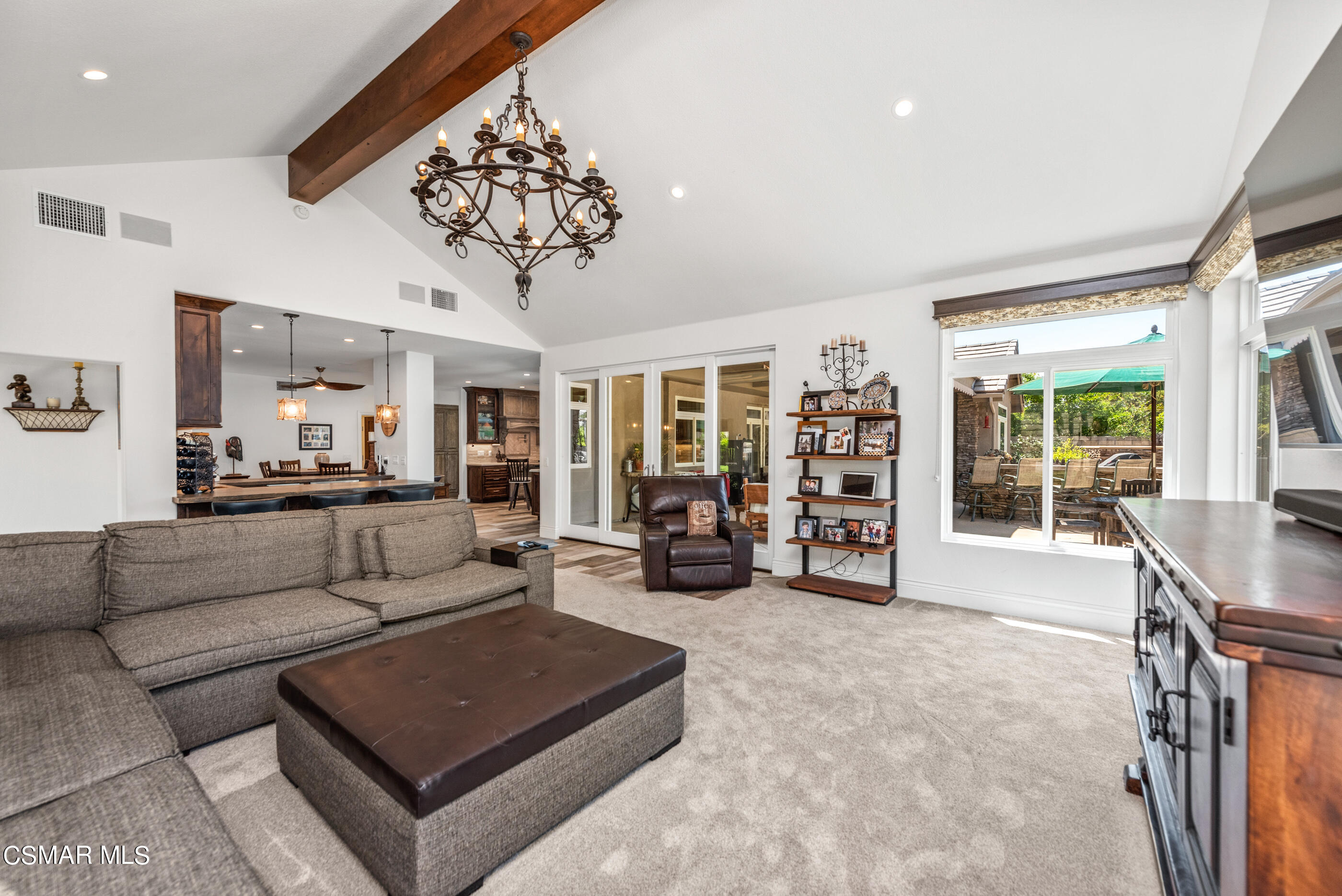 525 Aqueduct Court Simi Valley, CA 93065 - Photo 42 of 98 a living room with furniture a chandelier and a large window