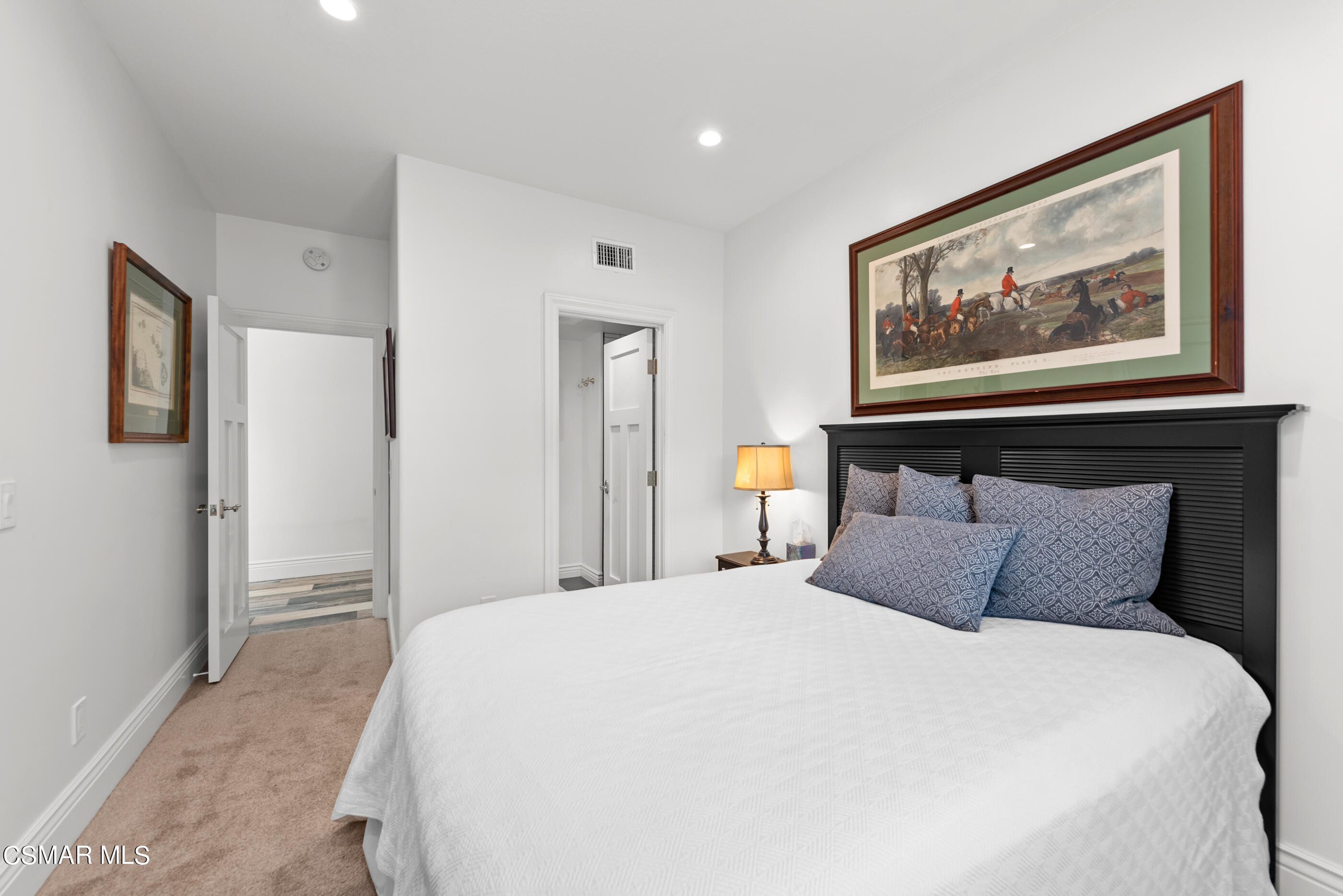 525 Aqueduct Court Simi Valley, CA 93065 - Photo 46 of 98 a bedroom with a large bed and a painting on the wall
