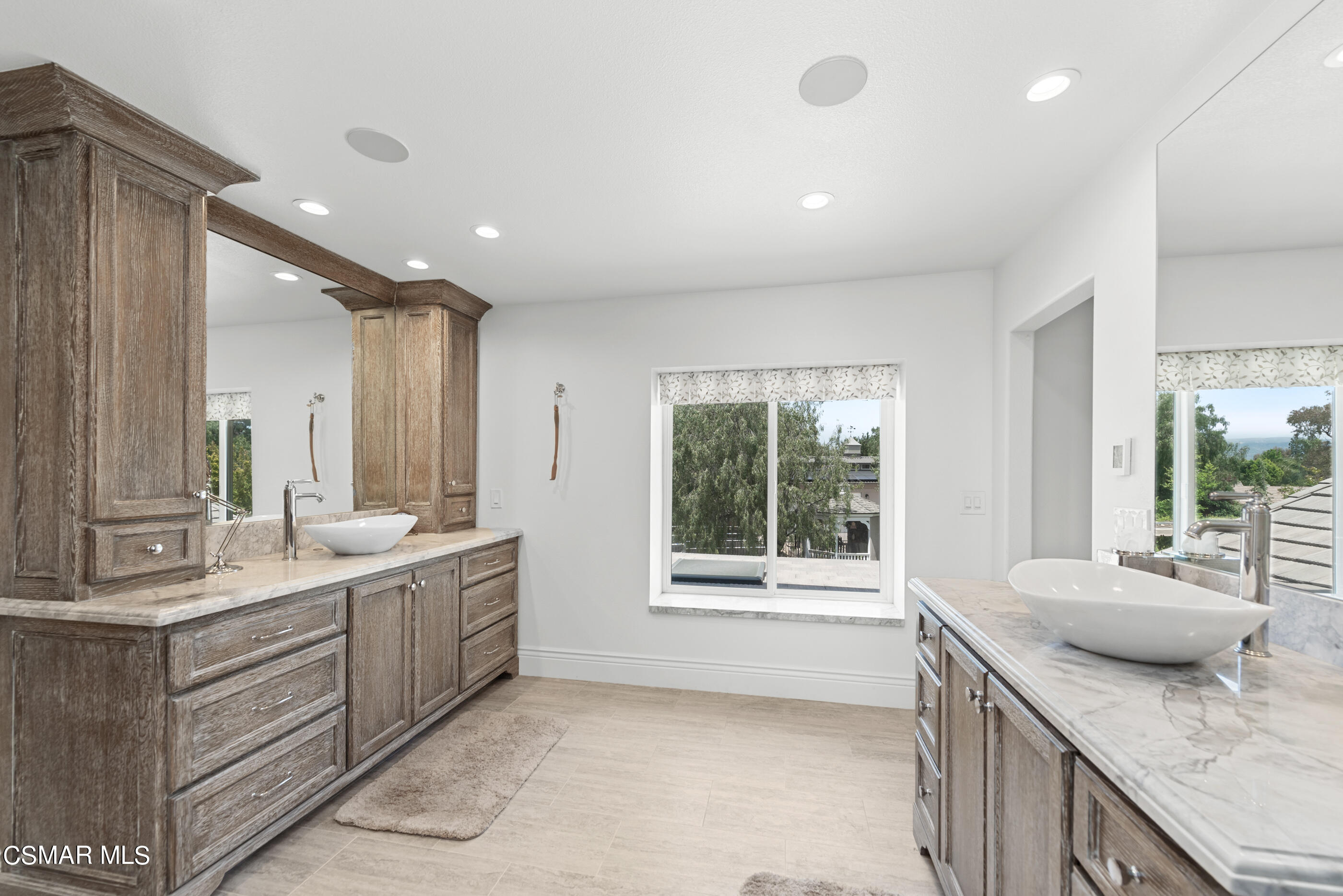 525 Aqueduct Court Simi Valley, CA 93065 - Photo 52 of 98 a bathroom with a granite countertop sink and a large mirror