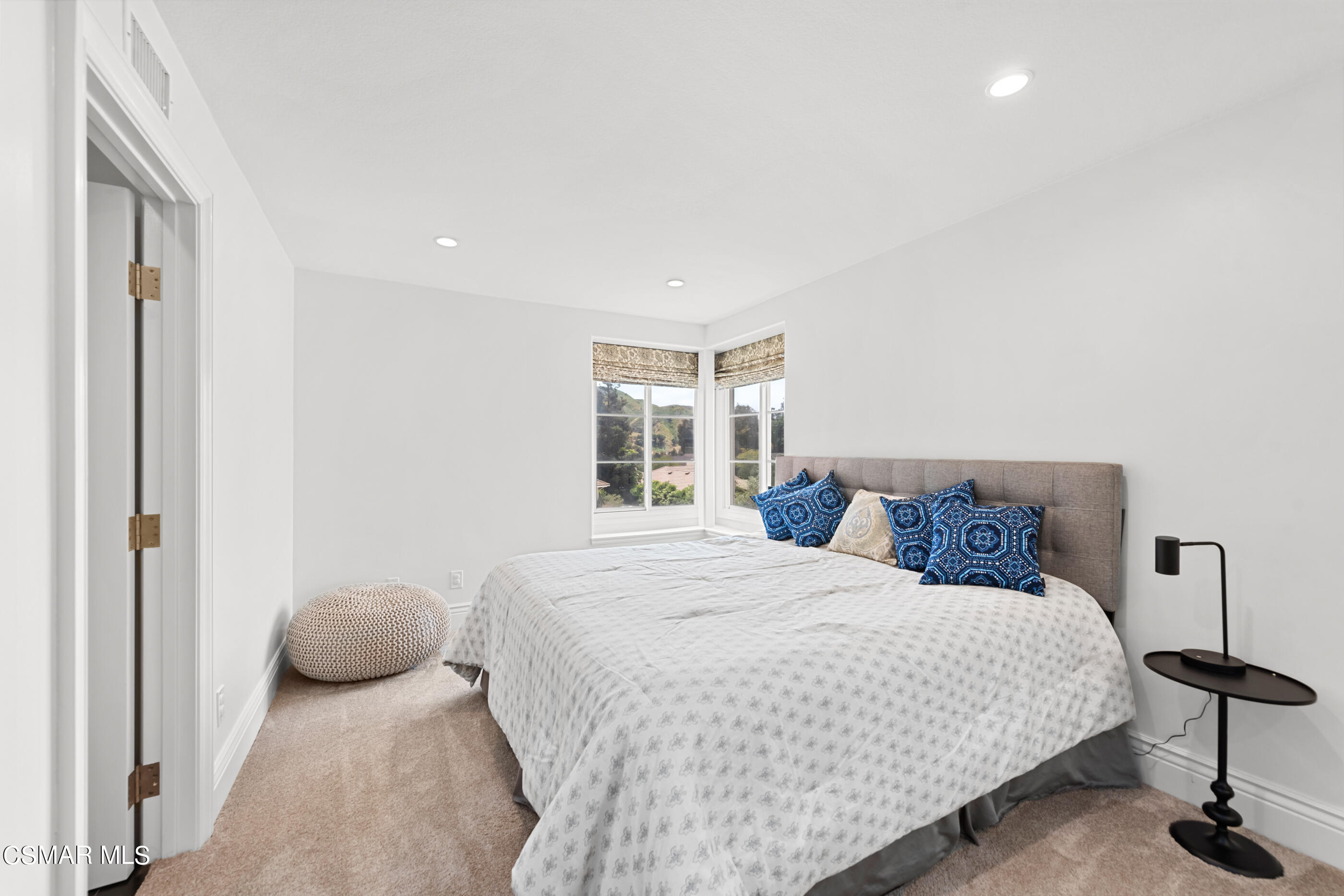 525 Aqueduct Court Simi Valley, CA 93065 - Photo 55 of 98 a bedroom with a bed and a window