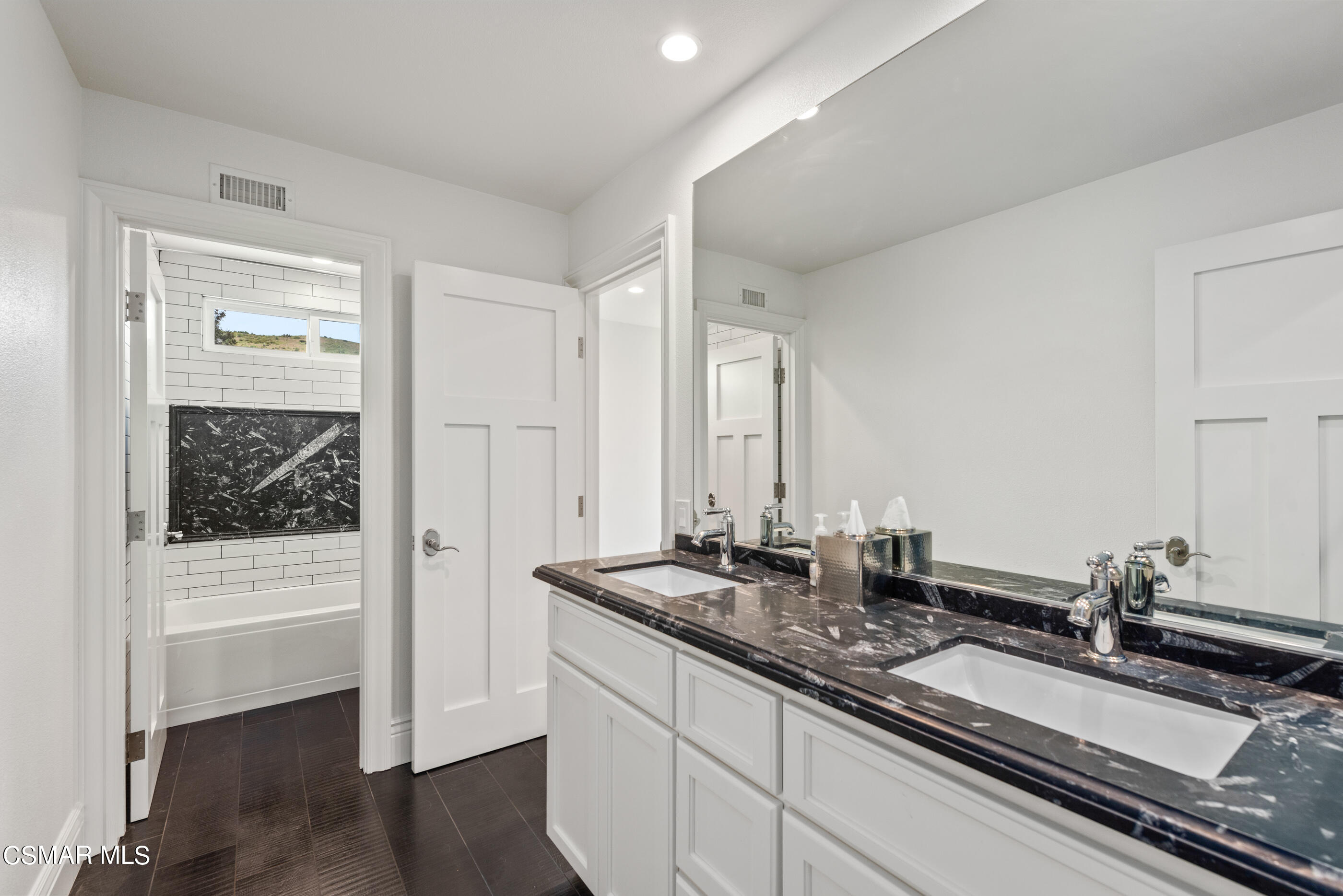 525 Aqueduct Court Simi Valley, CA 93065 - Photo 56 of 98 a bathroom with a sink and a mirror