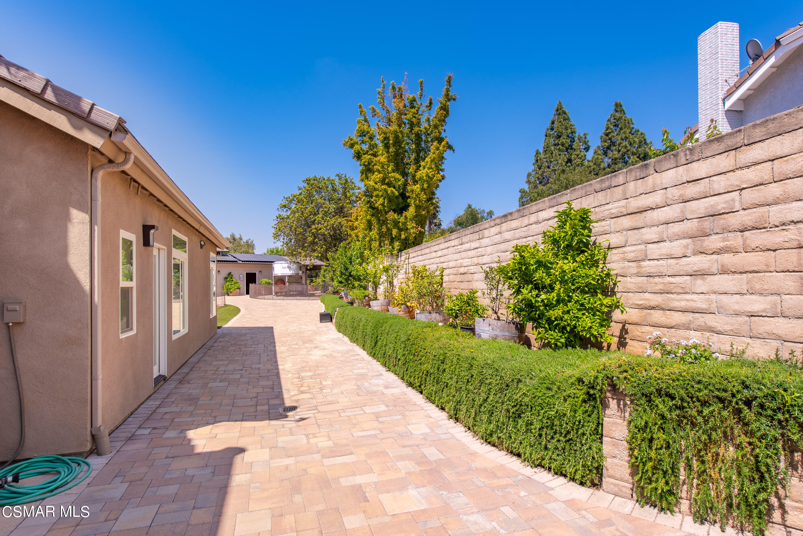 525 Aqueduct Court Simi Valley, CA 93065 - Photo 65 of 98 a view of a pathway with a yard