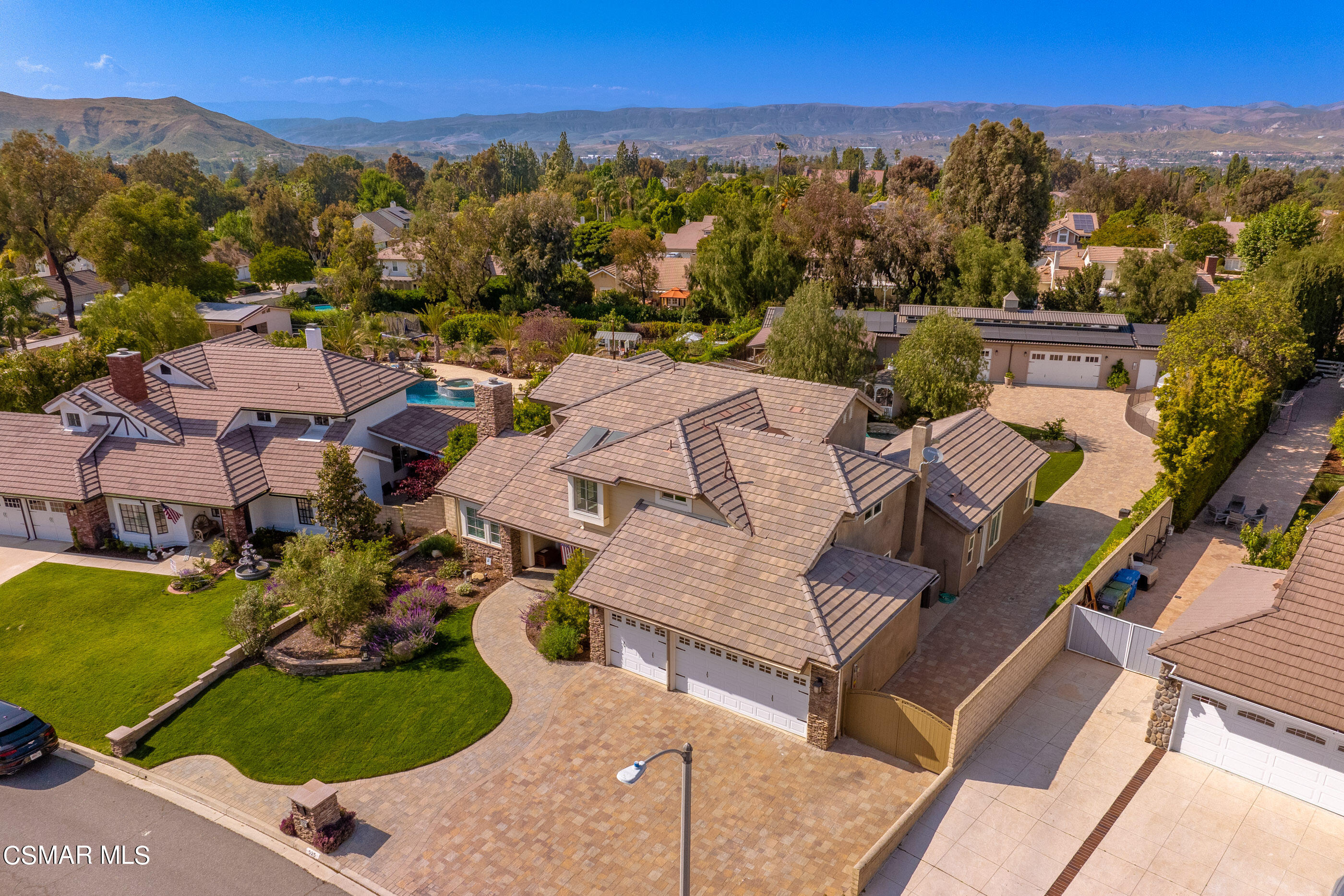 525 Aqueduct Court Simi Valley, CA 93065 - Photo 77 of 98 an aerial view of a house with garden space and mountain view in back