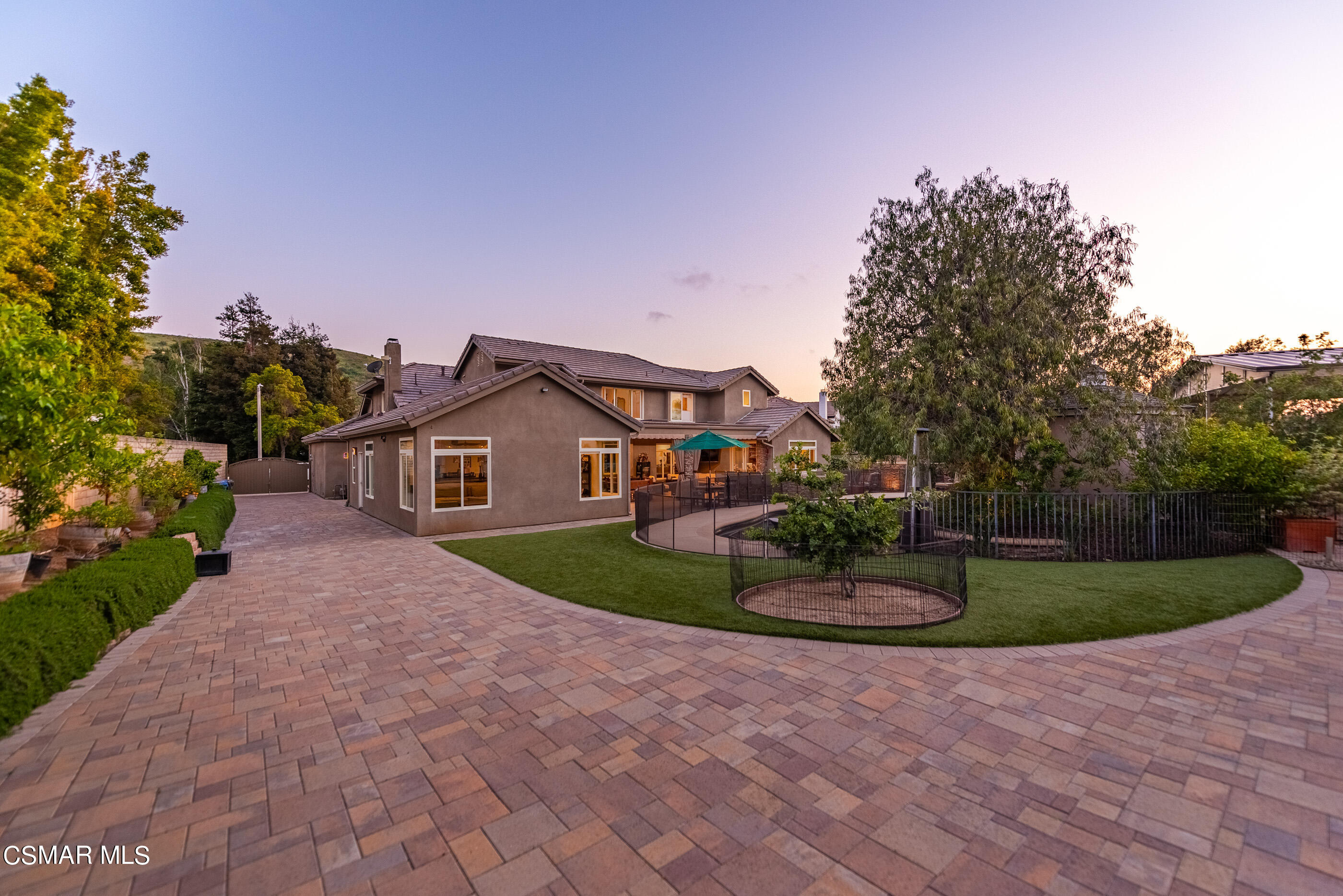 525 Aqueduct Court Simi Valley, CA 93065 - Photo 79 of 98 a front view of a house with a yard and garage