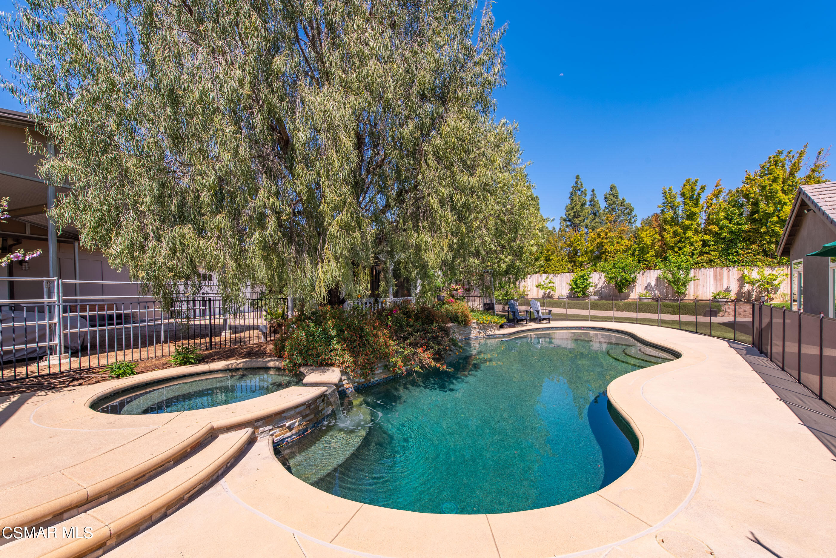 525 Aqueduct Court Simi Valley, CA 93065 - Photo 80 of 98 a view of a swimming pool with a outdoor seating