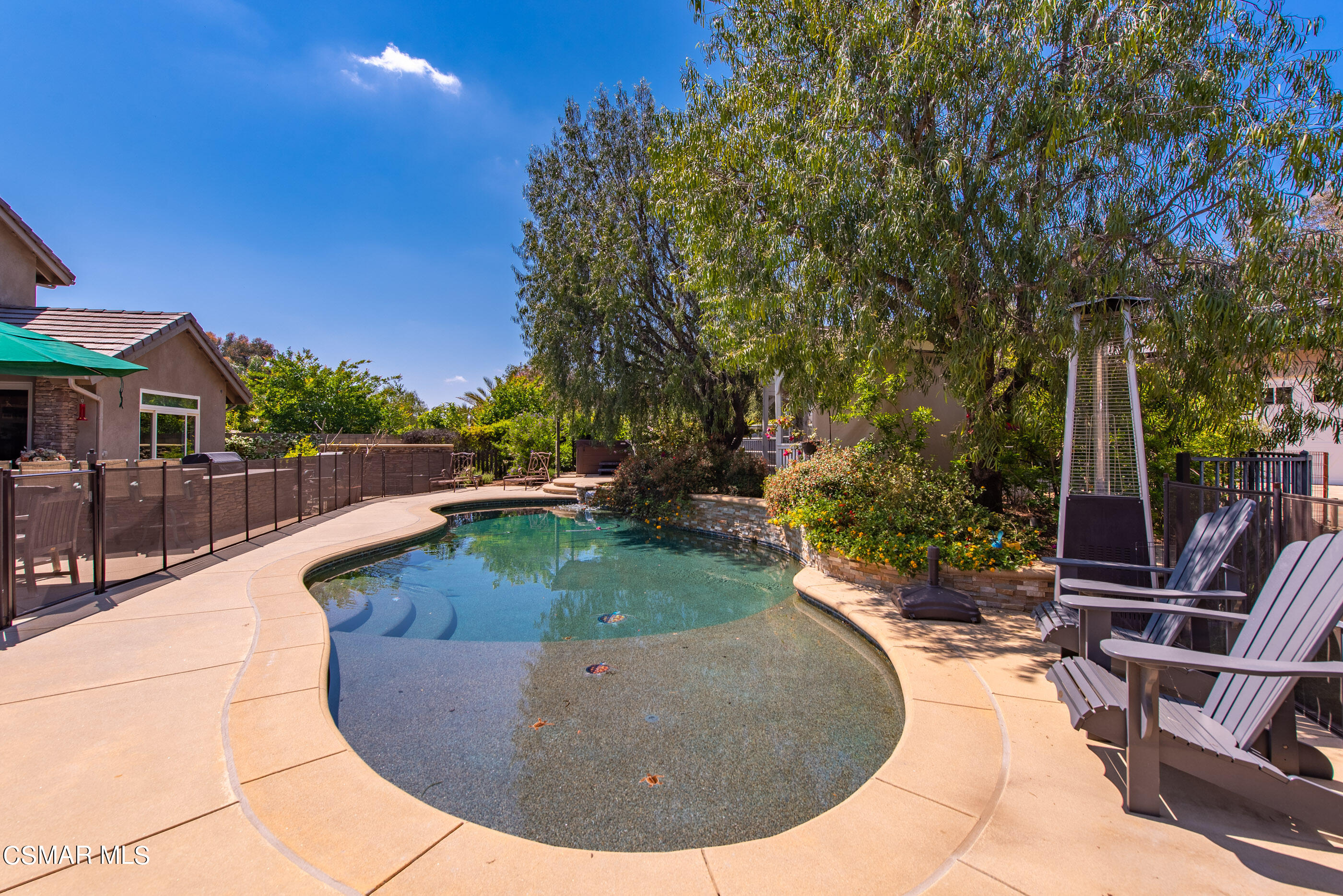 525 Aqueduct Court Simi Valley, CA 93065 - Photo 82 of 98 a view of a swimming pool with a patio
