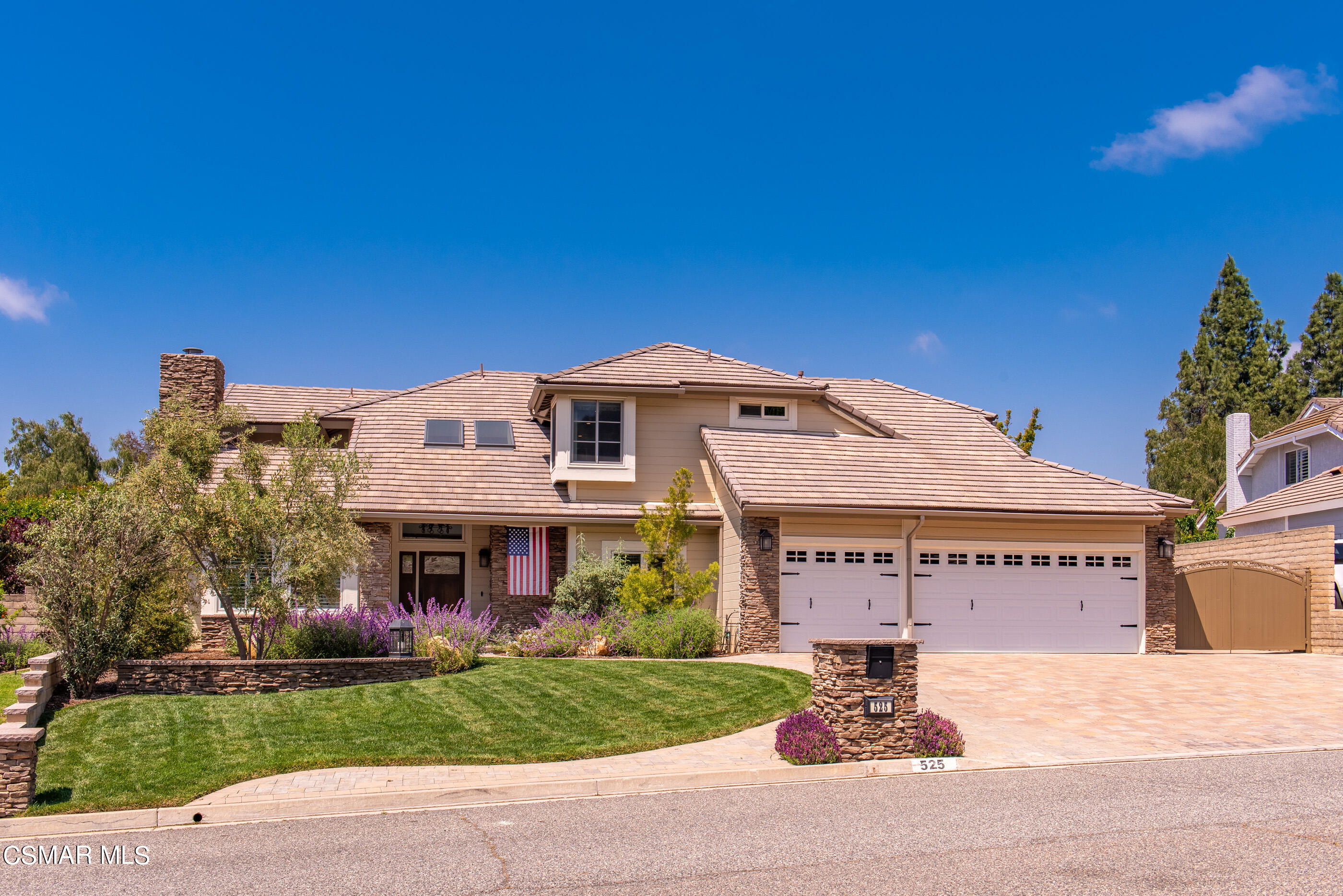 525 Aqueduct Court Simi Valley, CA 93065 - Photo 96 of 98 a front view of a house with a garden and yard