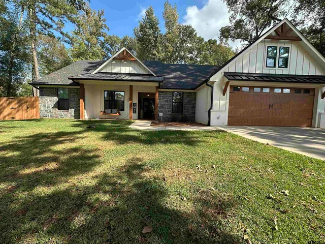 a front view of a house with street