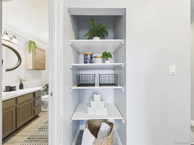 a view of living room with furniture and rug