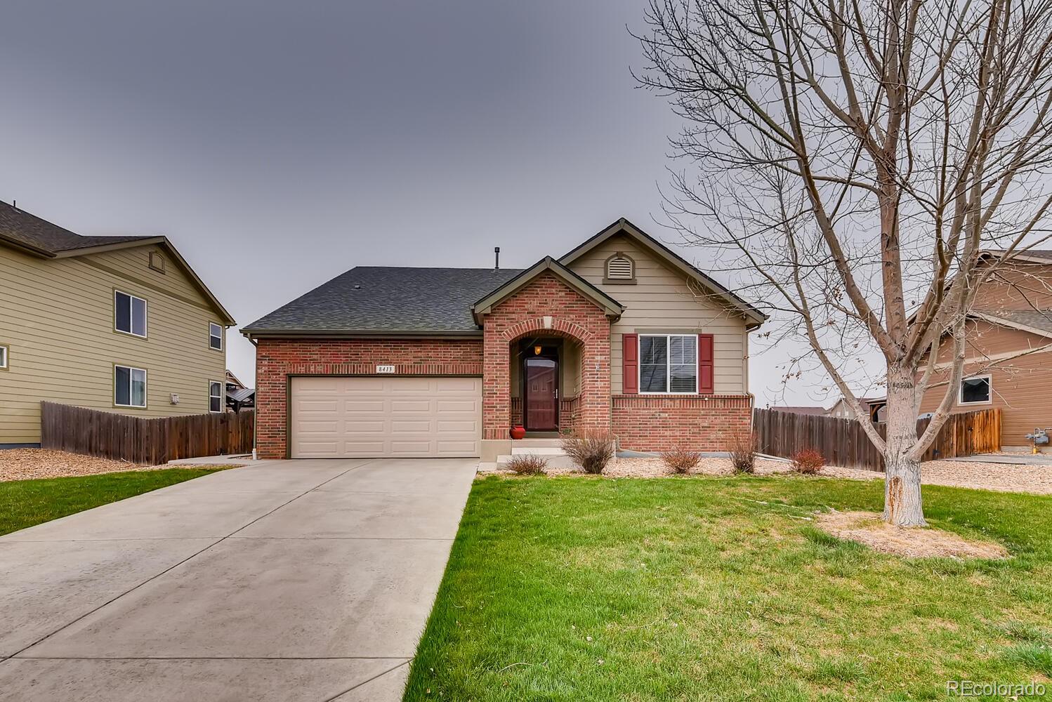 8413 Raspberry Drive Frederick, CO 80504 - Photo 1 of 27 a front view of house with yard and green space