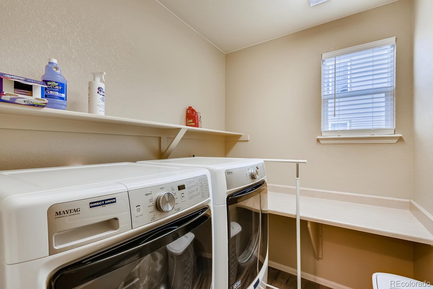 8413 Raspberry Drive Frederick, CO 80504 - Photo 25 of 27 a utility room with dryer and washer