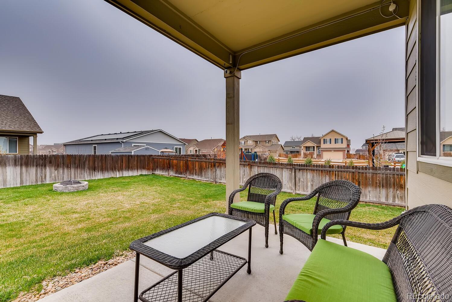 8413 Raspberry Drive Frederick, CO 80504 - Photo 26 of 27 a view of a chairs and table in the patio
