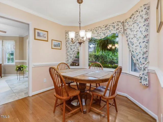 a kitchen with stainless steel appliances a stove sink microwave and refrigerator