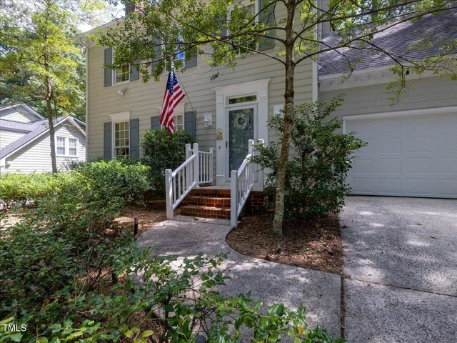front view of a house with a small yard