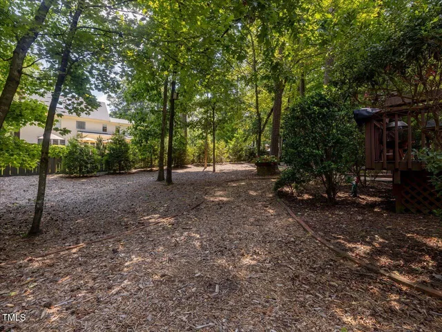 a view of pool with yard