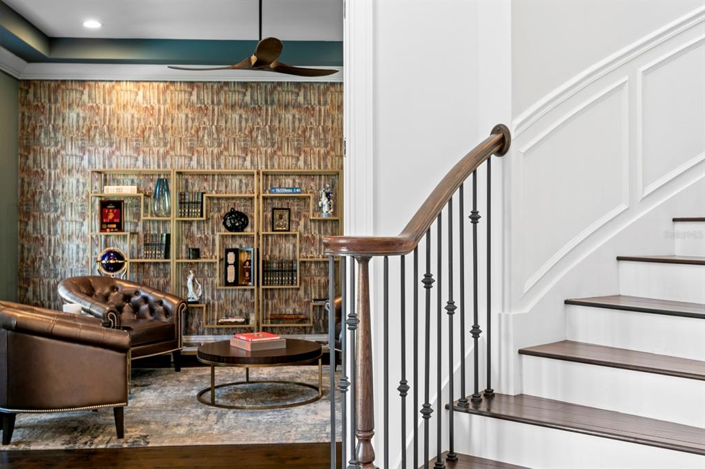 2604 South Bryant Circle Tampa, FL 33629 - Photo 16 of 49 a living room with furniture and a floor to ceiling window