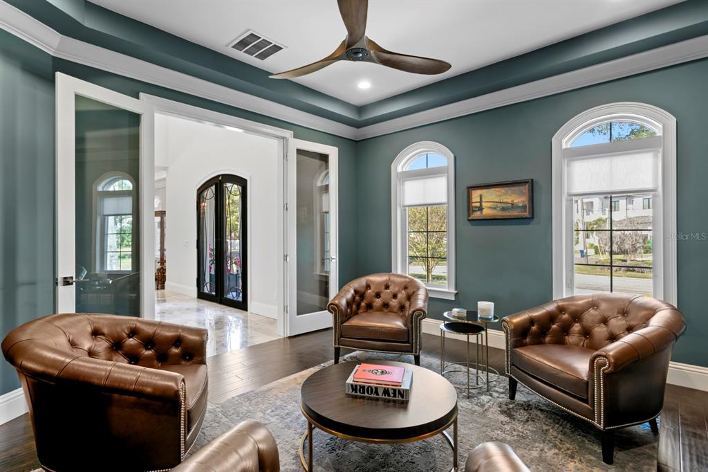 2604 South Bryant Circle Tampa, FL 33629 - Photo 18 of 49 a living room with furniture and a large window