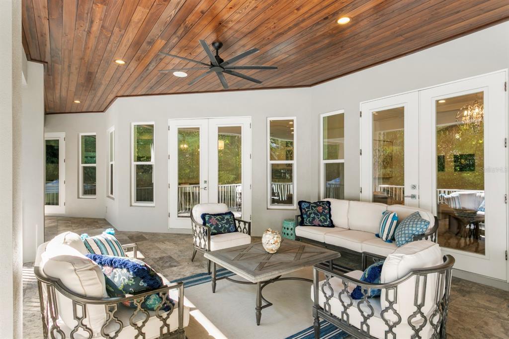 2604 South Bryant Circle Tampa, FL 33629 - Photo 43 of 49 a living room with furniture and floor to ceiling windows