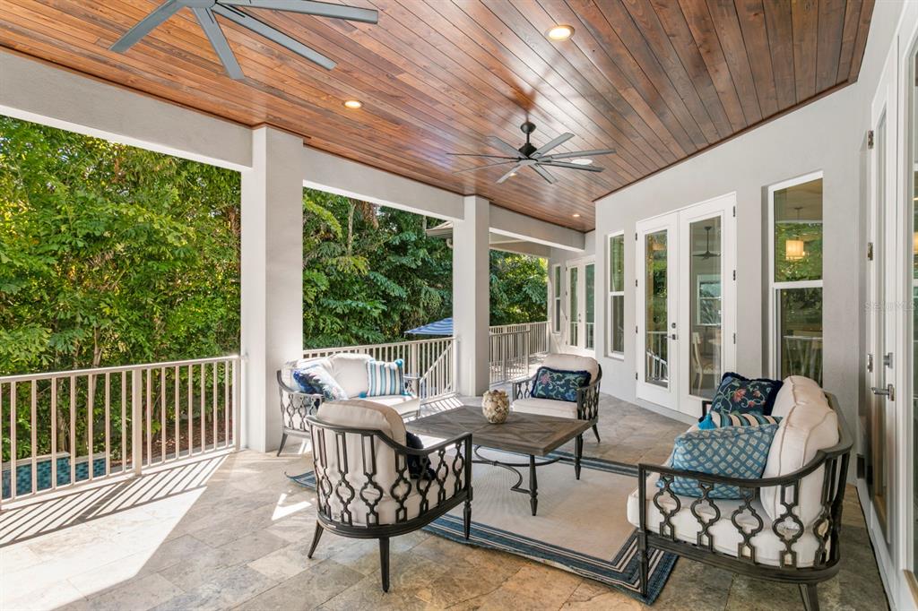 2604 South Bryant Circle Tampa, FL 33629 - Photo 44 of 49 a living room with patio furniture and a floor to ceiling window