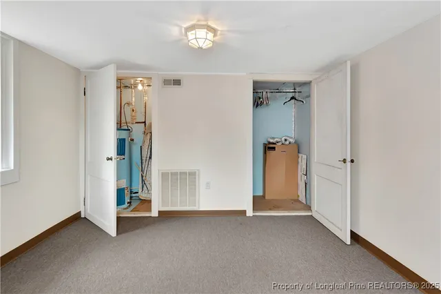 an empty room with a door