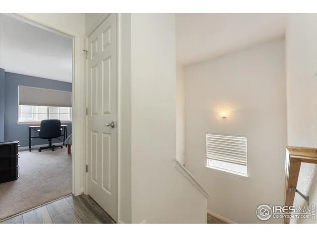 a bedroom with a bed and furniture