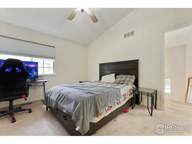a view of hallway with wooden floor