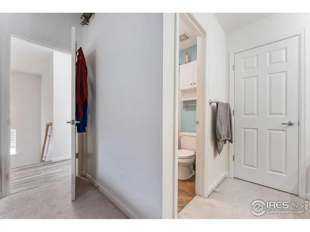 a bathroom with a toilet and a sink