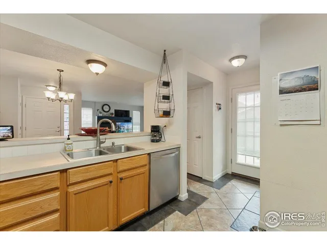 a bathroom with a sink a mirror and a shower