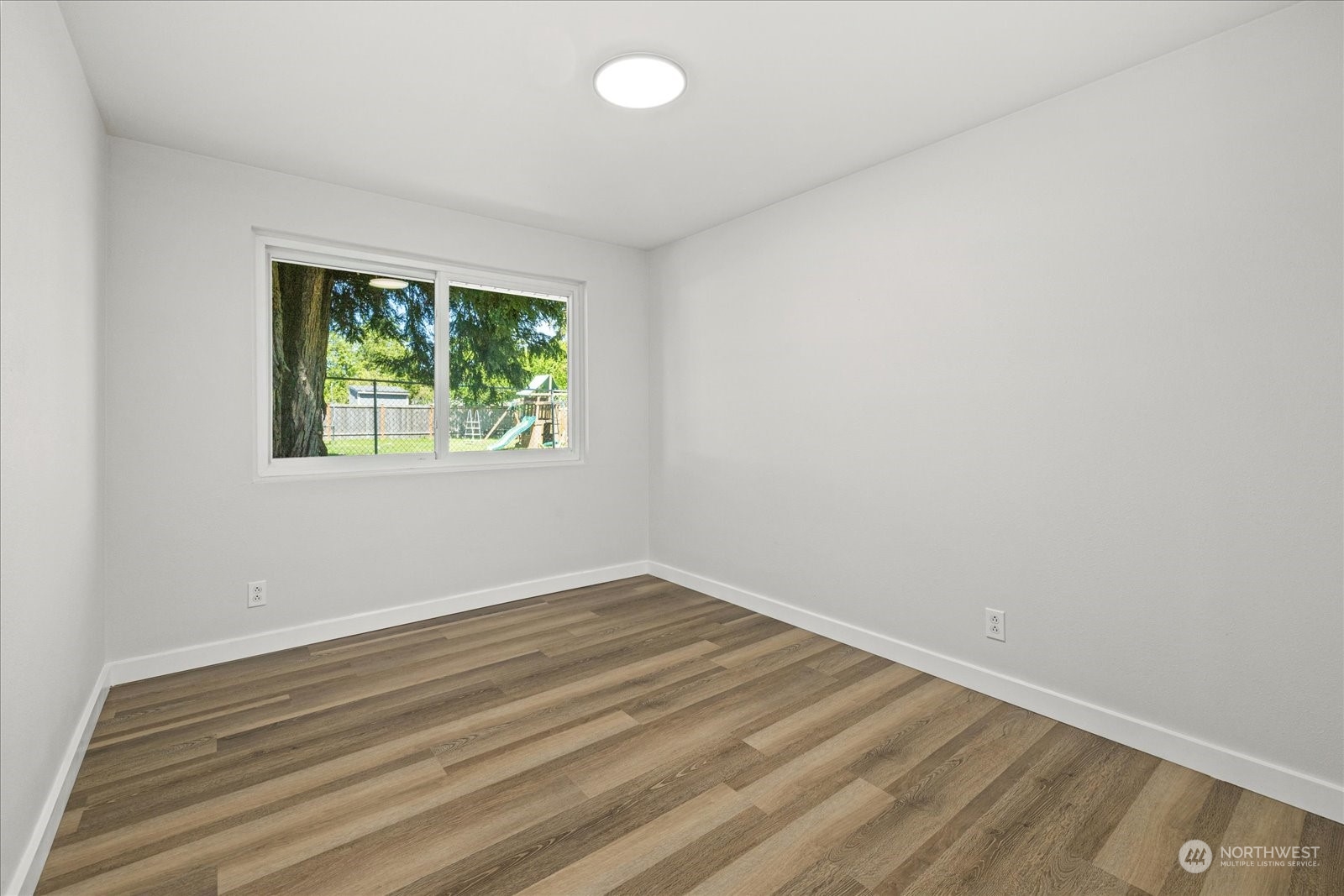 16820 120th Avenue Southeast Renton, WA 98058 - Photo 14 of 31 an empty room with a window