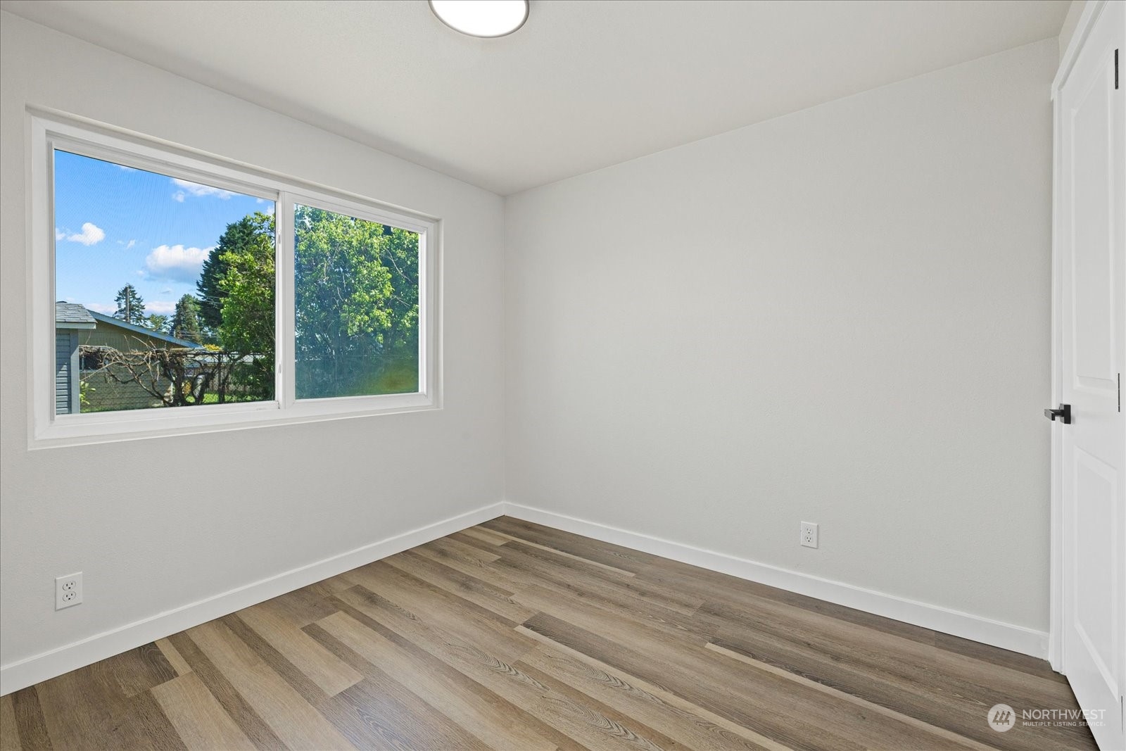 16820 120th Avenue Southeast Renton, WA 98058 - Photo 15 of 31 a view of a room that has a window in it