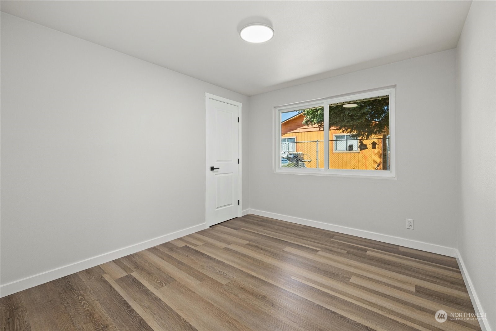 16820 120th Avenue Southeast Renton, WA 98058 - Photo 16 of 31 an empty room with a window