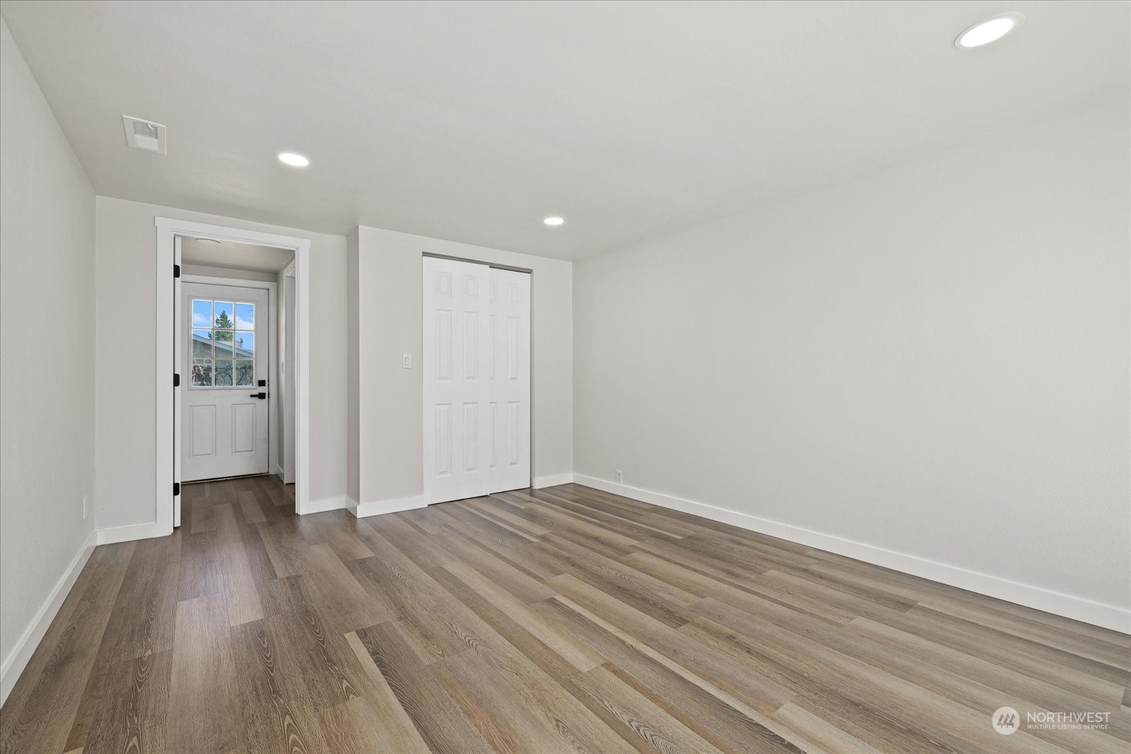 16820 120th Avenue Southeast Renton, WA 98058 - Photo 19 of 31 a view of hallway with wooden floor