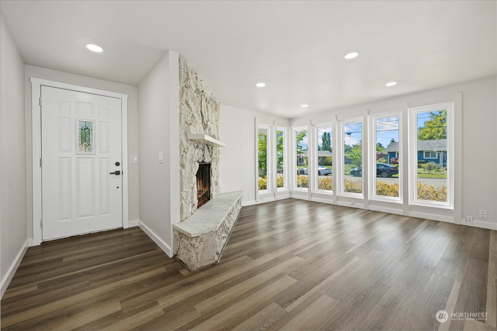 16820 120th Avenue Southeast Renton, WA 98058 - Photo 24 of 31 a view of an entryway with wooden floor and garden