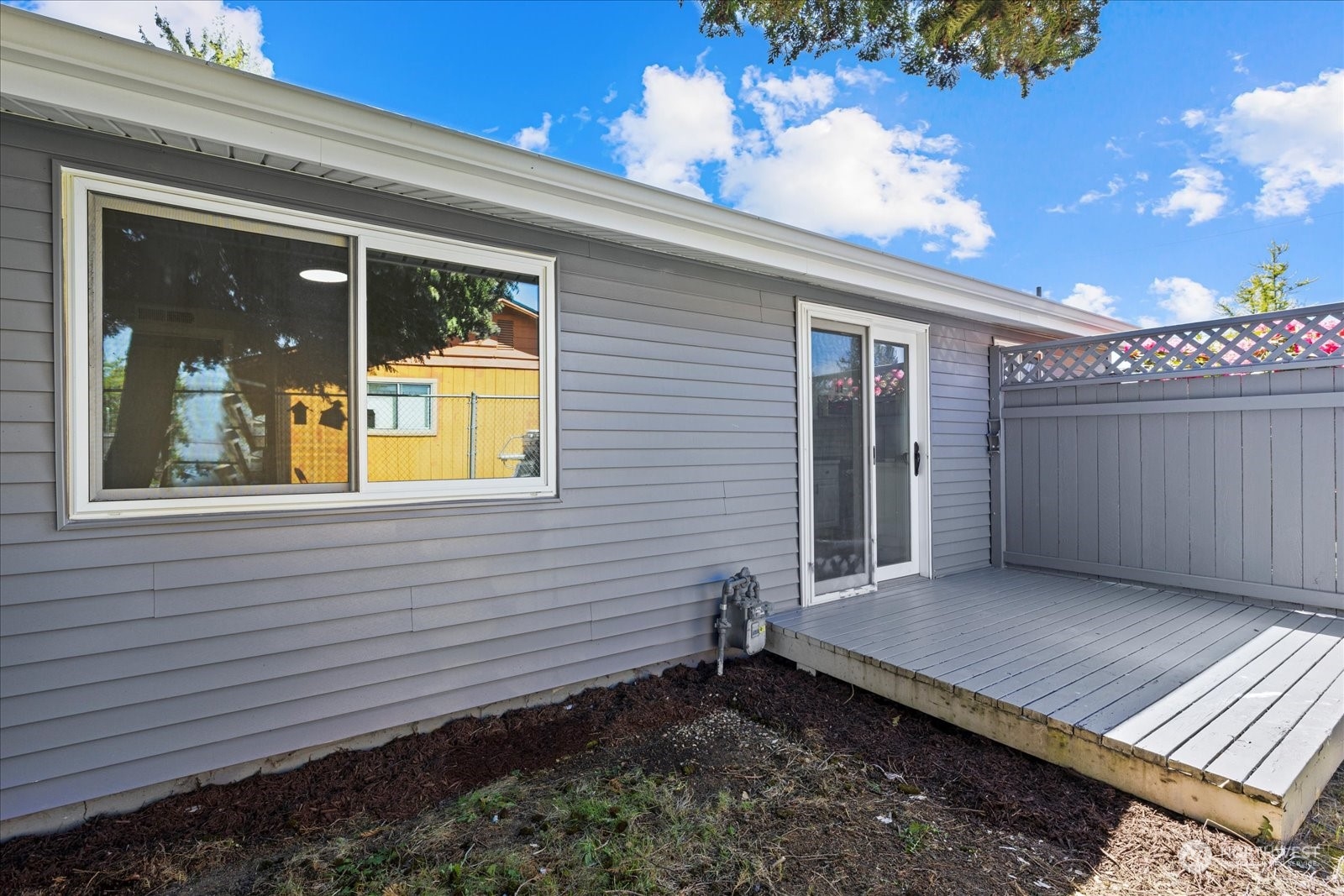 16820 120th Avenue Southeast Renton, WA 98058 - Photo 27 of 31 a front view of a house with a yard
