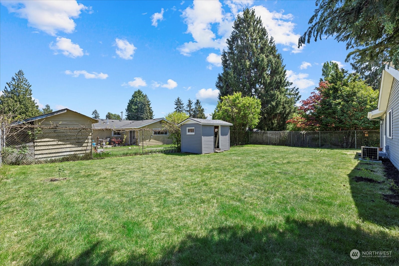 16820 120th Avenue Southeast Renton, WA 98058 - Photo 29 of 31 a front view of a house with a yard