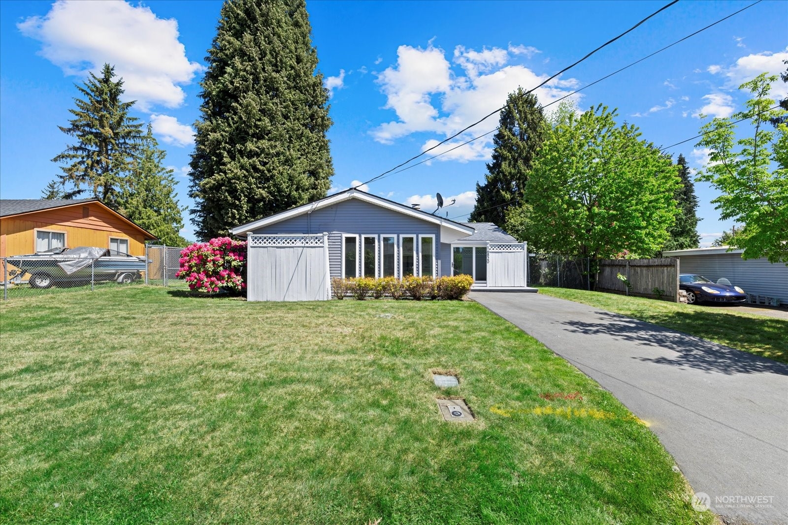 16820 120th Avenue Southeast Renton, WA 98058 - Photo 3 of 31 a front view of a house with garden