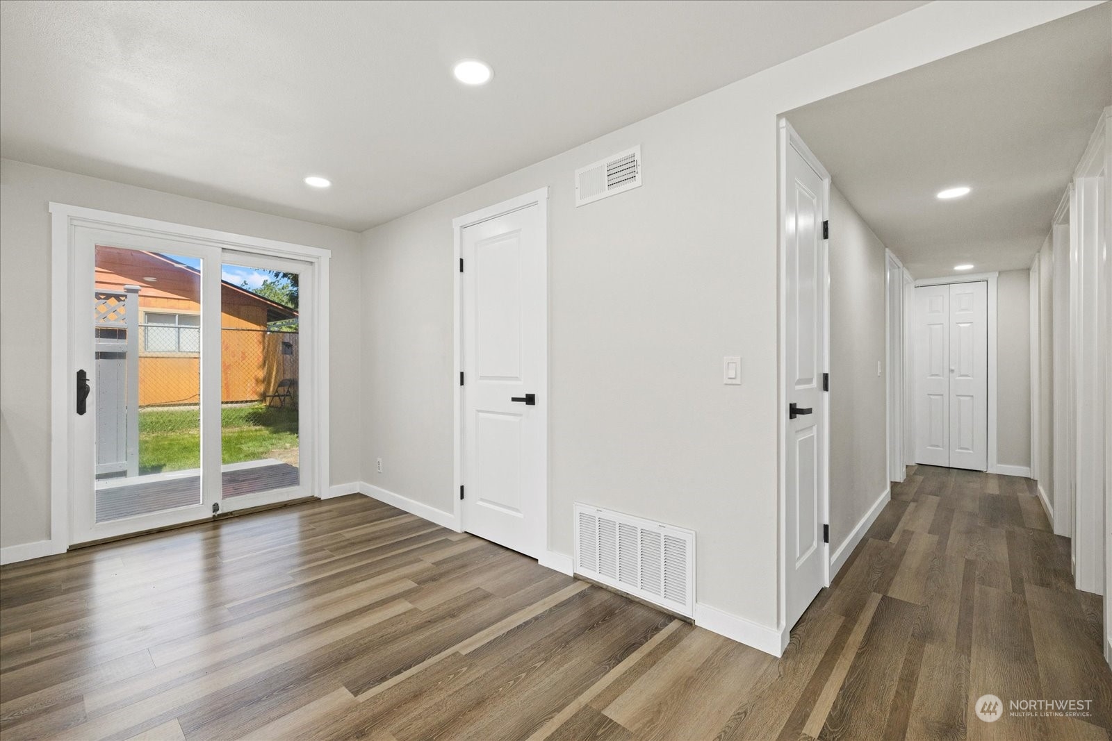 16820 120th Avenue Southeast Renton, WA 98058 - Photo 7 of 31 a view of entryway with wooden floor