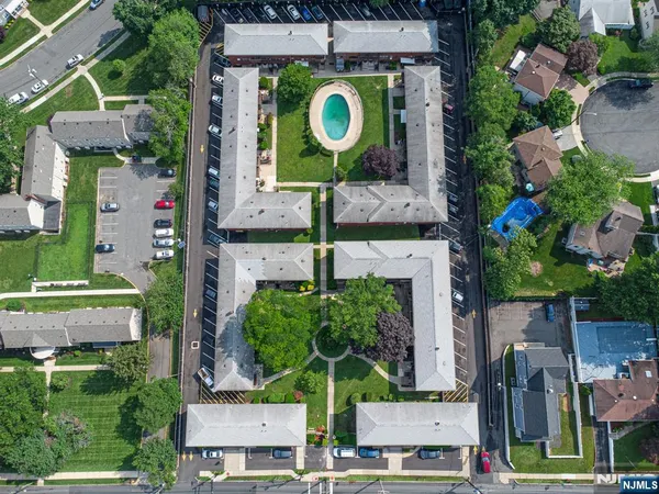 aerial view of a house with a swimming pool
