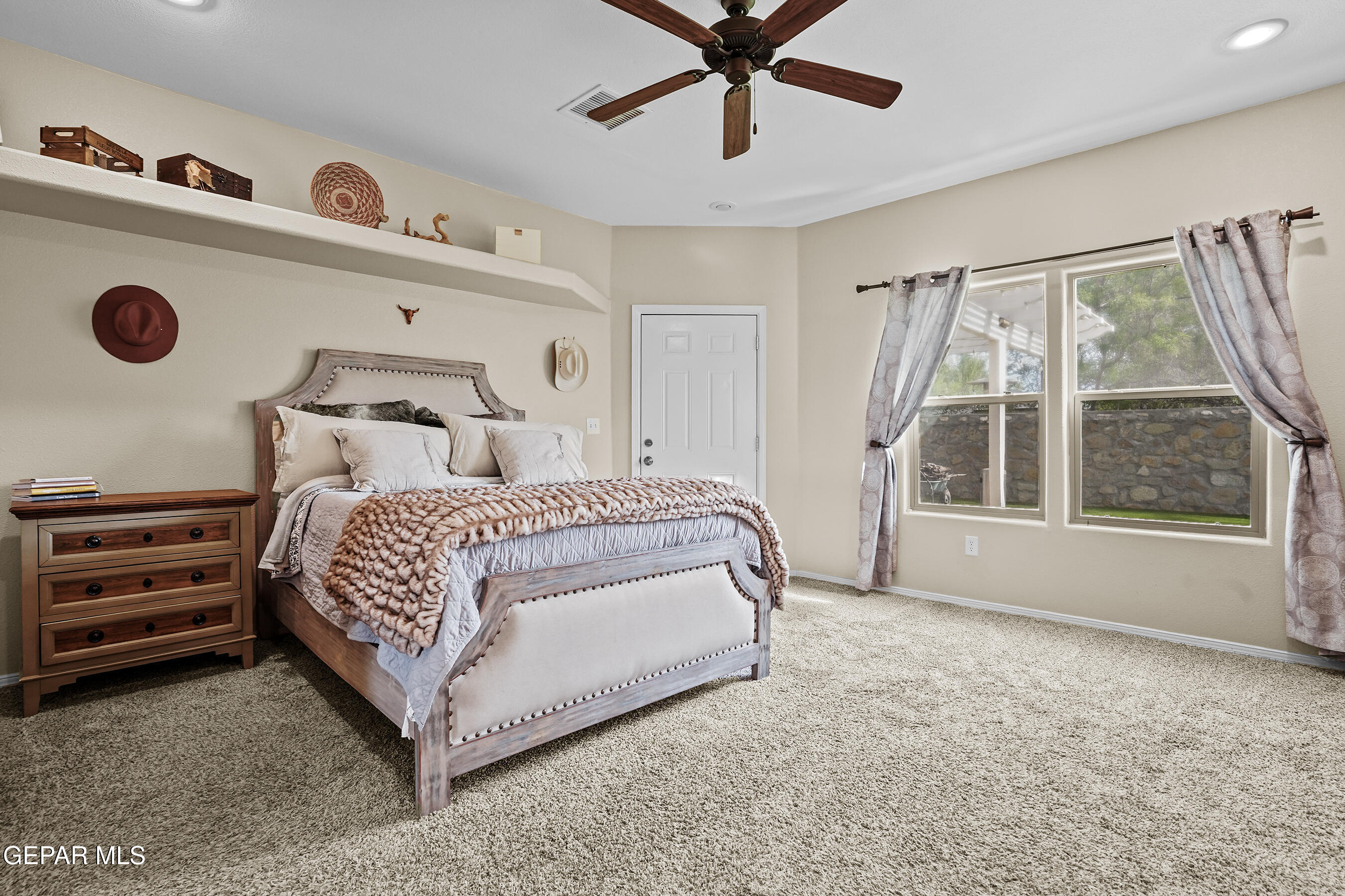 710 Mamie Road El Paso, TX 79932 - Photo 4 of 44 Comfortable & Light-Filled Primary Suite